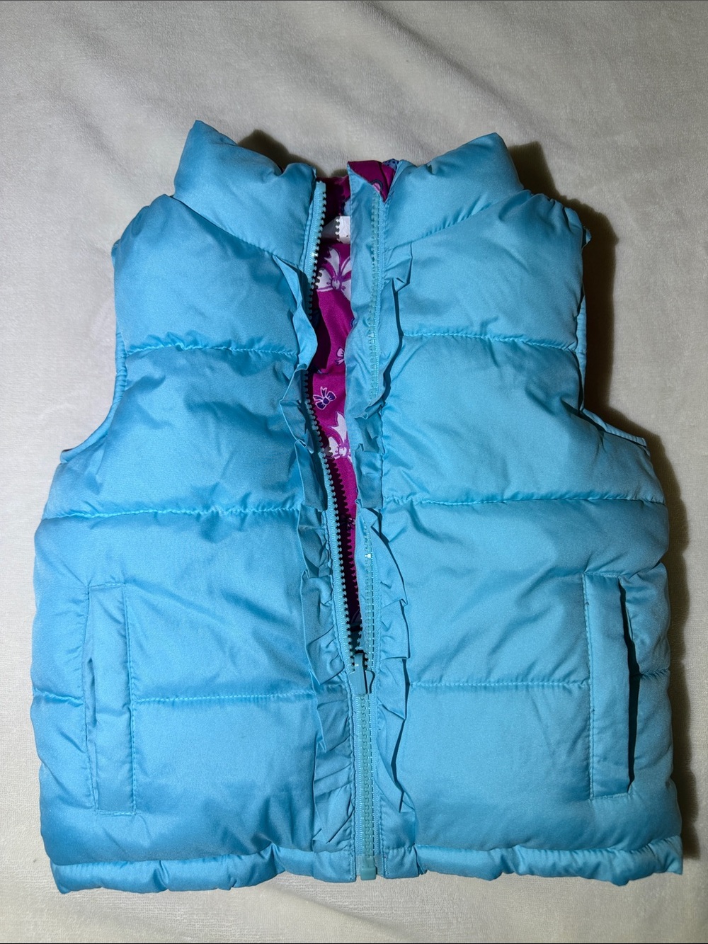 Light Blue Puffer Vest with Pink Floral Lining